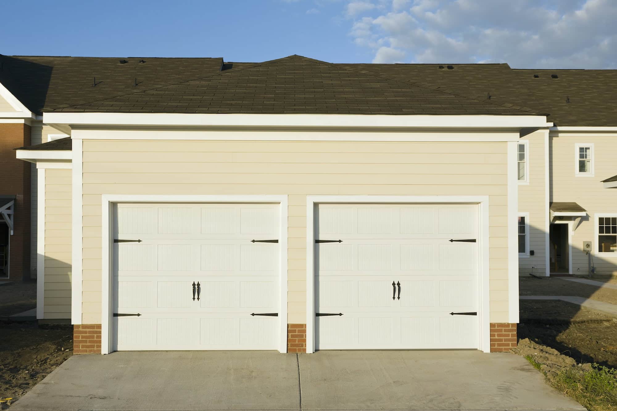 Residential garage door opener and track maintenance